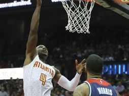 Paul Millsap anotó 29 puntos en la victoria de los Hawks. AP / C. Compton