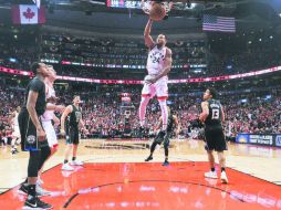 Norman Powell (#24) lideró la ofensiva de los Raptors al terminar con una cosecha de 25 puntos en su cuenta personal ayer. AP / N. Denette