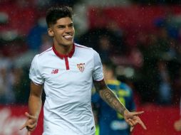 Joaquín Correa celebra después de abrir el marcador para el Sevilla. AFP / J. Guerrero