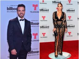 Jennifer López lució un vestido negro escarpado de innumerables transparencias y brillantes. ESPECIAL /