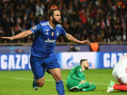 'Pipita' celebra su segundo gol de la noche. AFP / A. Poujoulat