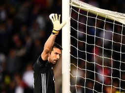 El portero Gianluigi Buffon es un baluarte de la defensa juventina. AFP / F. Fife