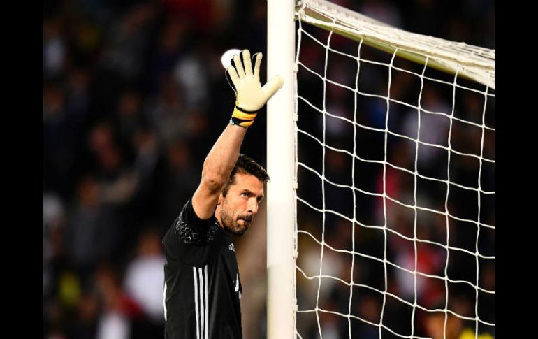 El portero Gianluigi Buffon es un baluarte de la defensa juventina. AFP / F. Fife