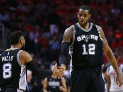 LaMarcus Aldridge (12) anotó 34 puntos, su mayor cifra en la temporada. AFP / R. Martínez