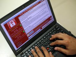 El Centro Nacional de Ciberseguridad británico dirige los trabajos para recuperar los equipos informáticos dañados en el ataque. EFE /