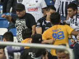 Los disturbios se registraron la noche del sábado, al terminar el partido de cuartos entre Monterrey y la UANL. MEXSPORT / J. Martínez