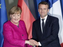 Merkel y Macron realiza su primera rueda de prensa conjunta tras una reunión privada este lunes. AP / K. Nietfeld