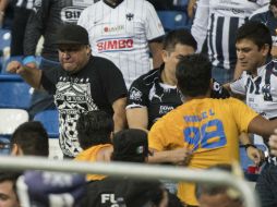 Al final del encuentro entre Tigres y Monterrey hubo pleito entre los aficionados que dejó un saldo de 30 detenidos y tres heridas. MEXSPORT / ARCHIVO