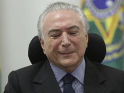 Los abogados de Temer alegan que no puede prestar testimonio mientras no se determine si la grabación que salió a la luz es legítima. AP / E. Peres