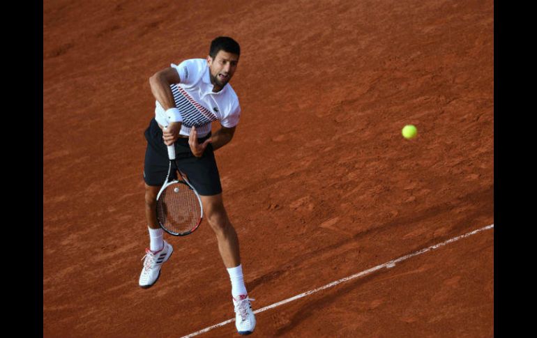 Es la undécima vez que el serbio se mete en cuartos de final en Roland Garros. AFP / L. Bonaventure