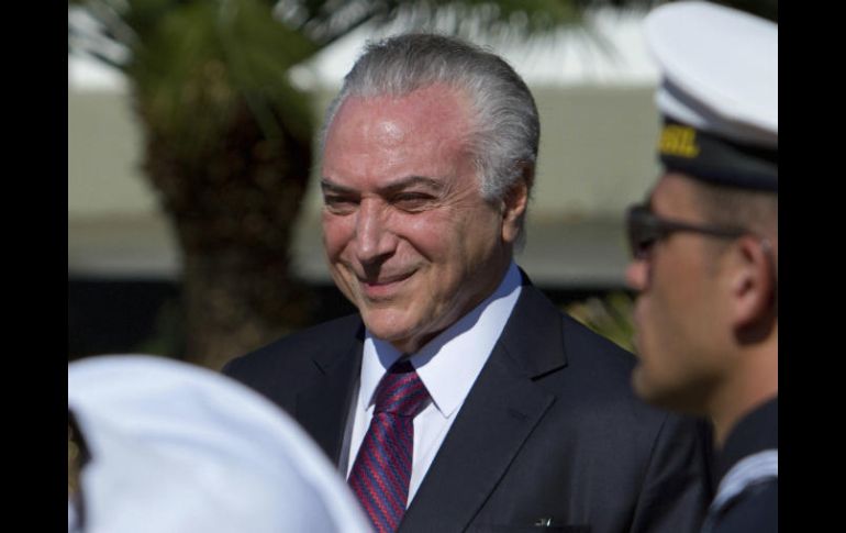 La decisión es una victoria para Temer, quien ha enfrentado crecientes llamados para que renuncie. AP / E. Peres