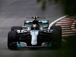 Bottas establece la mejor marca de la primera ronda, más rápido que Hamilton y mejor que el alemán Vettel. AFP / M. Thompson