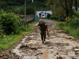 Los elementos fueron arrastrados por una avalancha de lodo y piedras provocada por las intensas lluvias. NTX / ARCHIVO