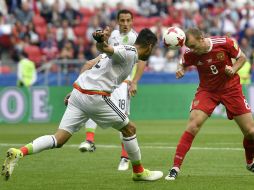 México empareja el marcardor seis minutos después de Rusia con un gran gol de cabeza de Néstor Araujo. AP / M. Meissner