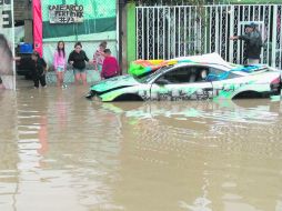 Personal de Protección Civil realizó el saneamiento en la zona para que el agua bajara de nivel. EL INFORMADOR / ESPECIAL