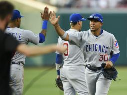 Jon Jay (#30) conectó el doblete que encaminó a los Cachorros a la victoria ayer ante Washington. AP / N. Wass