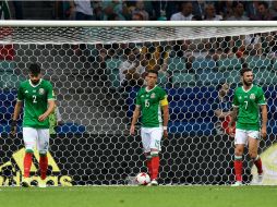 Araujo, Moreno y Layún, sus caras lo dicen todo. Los alemanes pusieron a México contra las cuerdas en el arranque del partido. AFP / A. Nemenov