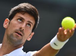 ''Nole'' llega a Wimbledon tras ganar en el torneo de Eastbourne  su segundo título de la temporada. AFP / G. Kirk