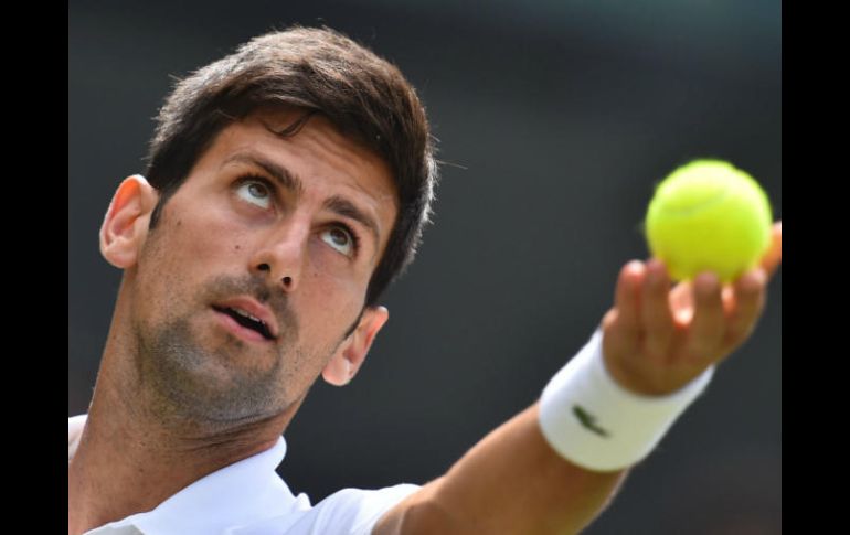 ''Nole'' llega a Wimbledon tras ganar en el torneo de Eastbourne  su segundo título de la temporada. AFP / G. Kirk