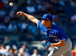 El sinaloense entró en el noveno inning y el primer out lo consiguió con elevado al central. AFP / J. McIsaac