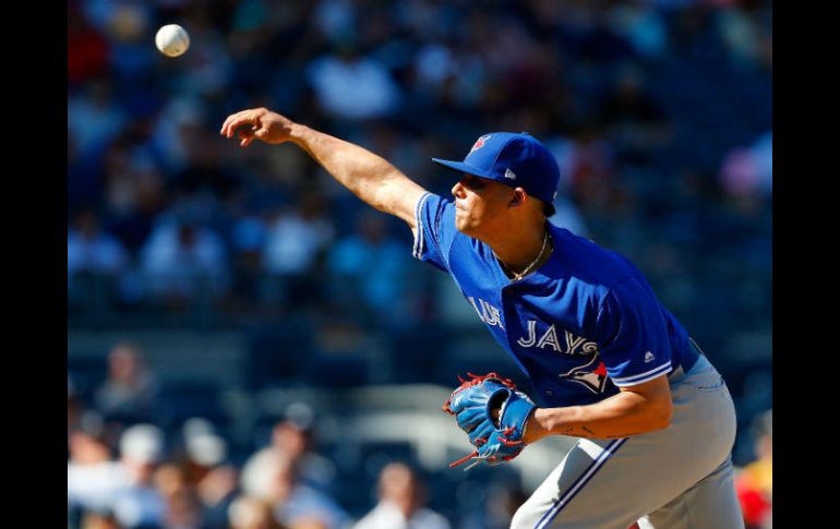 El sinaloense entró en el noveno inning y el primer out lo consiguió con elevado al central. AFP / J. McIsaac