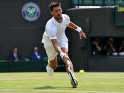 En una jornada de calor intenso -31 grados Celsius, con desmayos de espectadores incluidos-, Djokovic logró no desgastarse mucho. AFP / G. Kirk