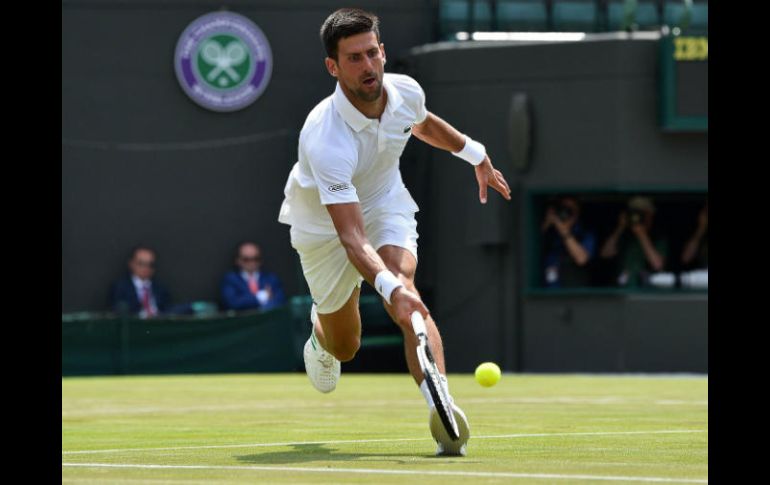 En una jornada de calor intenso -31 grados Celsius, con desmayos de espectadores incluidos-, Djokovic logró no desgastarse mucho. AFP / G. Kirk