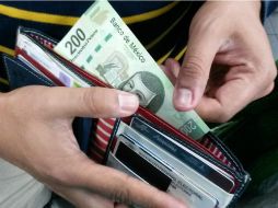 La propuesta de la Coparmex es incrementar los salarios mínimos de 80.04 a 92.71 pesos. EL INFORMADOR / ARCHIVO