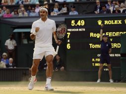 El tenista helvético celebra tras ganar un punto a su rival, en el juego de semifinales en el All Englands Club. AP / A. Grant