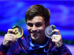 Daley ganó plata desde 3 metros sincronizado mixto y el oro en la plataforma desde 10 metros. AFP / M. Bureau