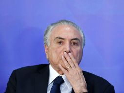 La oposición acusa a Temer de haber liberado en las últimas semanas cuantiosos fondos para proyectos de diputados vacilantes. AFP /