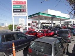 En la Ciudad de México, los precios más bajos se ubicarán en 15.87 pesos en la Magna, en 17.77 para la Premium y en 16.43 pesos. SUN / ARCHIVO