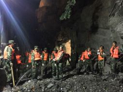 El deslizamiento en la aldea de Gengdi se produjo debido a las fuertes lluvias que cayeron en la zona. AFP / STR