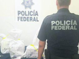 El oro era transportado en cinco bolsas tipo costal con sellos de seguridad. ESPECIAL /