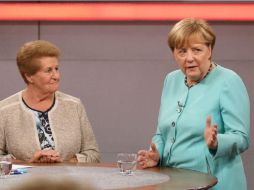 En un programa de la cadena RTL, Merkel Invitó a todos a ‘dar su voto aquí, en un país libre’. AFP / A. Friese