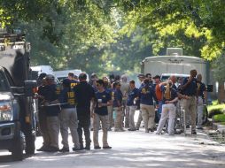 Las autoridades evacuaron hoy a residentes cerca de una casa, propiedad de los padres de Schneck. AP / G. Vasquez