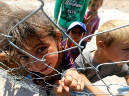 Los niños son el sector más vulnerable en este conflicto, pues son usados también como escudos humanos por los yihadistas. AFP / D. Souleiman