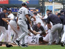 Jugadores de Tigres y Yankees se enfrascaron en la bronca. AFP / G. Shamus