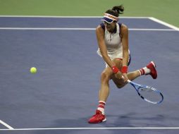 Muguruza logró imponerse al intenso juego de su rival con una demostración del progreso en su juego. AP / J. Cortez