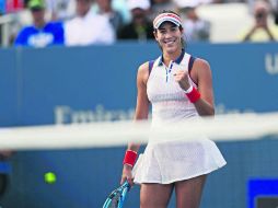 En una hora y un minuto, Garbiñe Muguruza despachó a Magdalena Rybarikova. AP / M. Noble