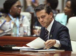 Peña Nieto indicó que el volumen de los intercambios comerciales actuales no se corresponde con 'el enorme potencial' de los países. AP / W. Hong