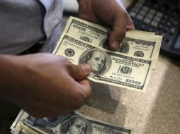 El fortalecimiento del dólar es resultado de la relativa calma que existe en los mercados internacionales. AP / ARCHIVO