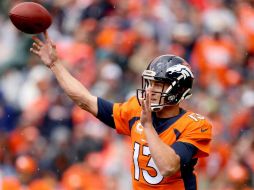 Trevor Siemian fijó un récord personal con cuatro pases de touchdown. AFP / D. Bradford