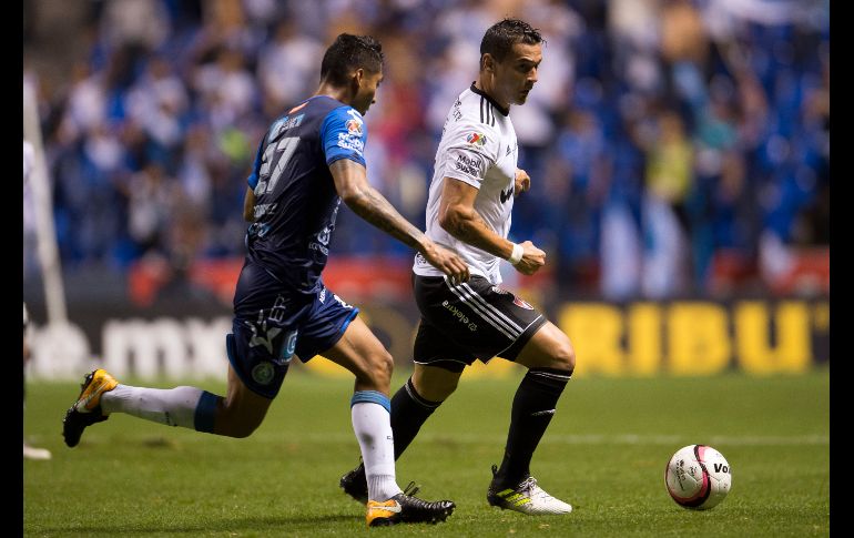 Caraglio (D) afirma que el plantel está contento con el técnico 'Profe' Cruz. MEXSPORT/ O. Aguilar