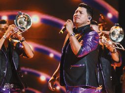 Los miembros de la Banda MS no desperdiciaron la ocasión de felicitar a este medio. EL INFORMADOR/ARCHIVO