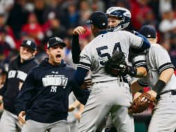 Divisional Round - New York Yankees v Cleveland Indians - Game Five - CLEVELAND, OH - OCTOBER 11: Aroldis Chapman #54 of the New York Yankees celebrates with teammates after their 5 to 2 win over the Cleveland Indians in Game Five of the American League Divisional Series at Progressive Field on October 11, 2017 in Cleveland, Ohio.   Jason Miller/Getty Images/AFP== FOR NEWSPAPERS, INTERNET, TELCOS & TELEVISION USE ONLY == SPO-BBO-BBA-BBN-DIVISIONAL-ROUND---NEW-YORK-YANKEES-V-CLEVELAND- - No more than 7 images from any single MLB game, workout, activity or event may be used (including online and on apps) while that game, activity or event is in progress.== FOR NEWSPAPERS, INTERNET, TELCOS & TELEVISION USE ONLY ==