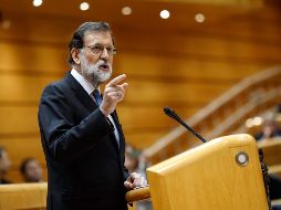 ''Ha llegado el momento de que se imponga la ley por encima de cualquier otra consideración. No contra Cataluña, sino para impedir que se abuse de Cataluña. No para suspender la autonomía de Cataluña, sino para consolidarla'', aseguró Rajoy. AFP / O. Del Pozo