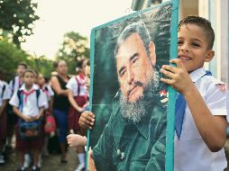 Símbolo. Un retrato de Fidel Castro, durante un acto en una escuela primaria en La Habana, Cuba. EFE