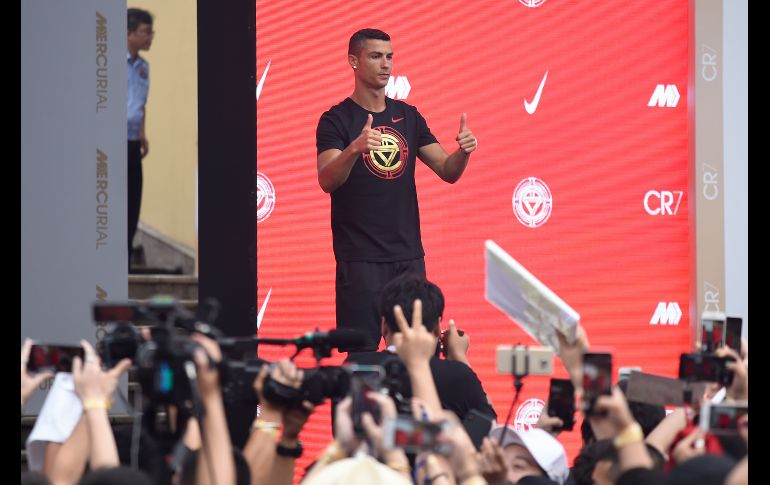 El futbolista portugués Cristiano Ronaldo asiste a un evento promocional en Pekín, China. AFP/W. Zhao