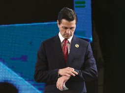 Enrique Peña, en su llegada al Encuentro Empresarial en Antigua, Guatemala. AP